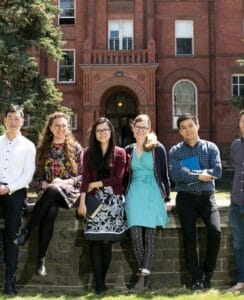 COVER Inside College Students in front of building