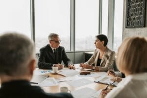 a peer advisory group sitting around a table